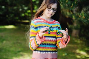 A girl with autism after a child autism assessment in Kent